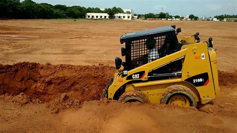 can you dig a basement with a skid steer|digging with a skid steer.